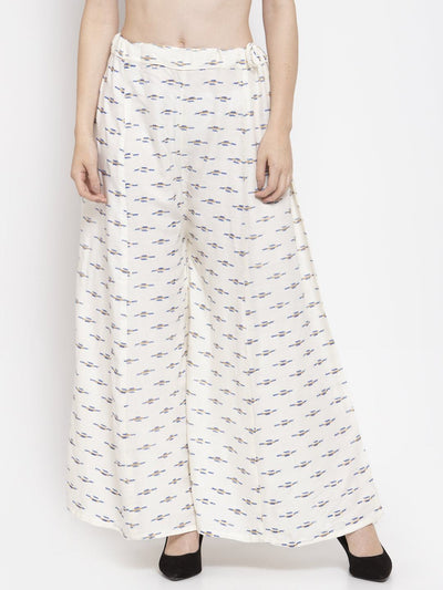 Cream flared printed rayon sharara with elastic waistband.