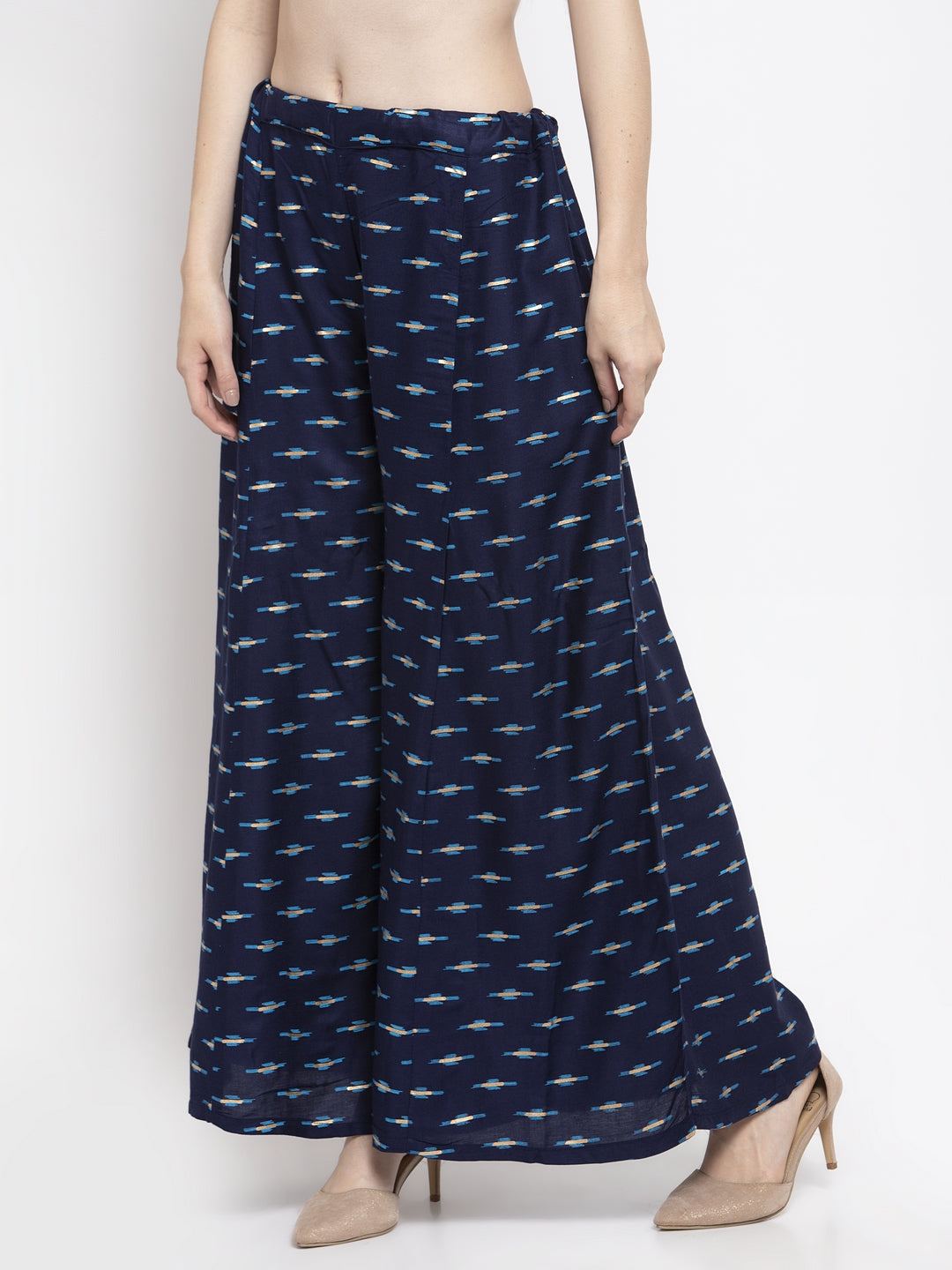 Navy blue flared rayon sharara with printed design and elasticated waistband.