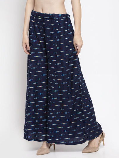 Navy blue flared rayon sharara with printed design and elasticated waistband.