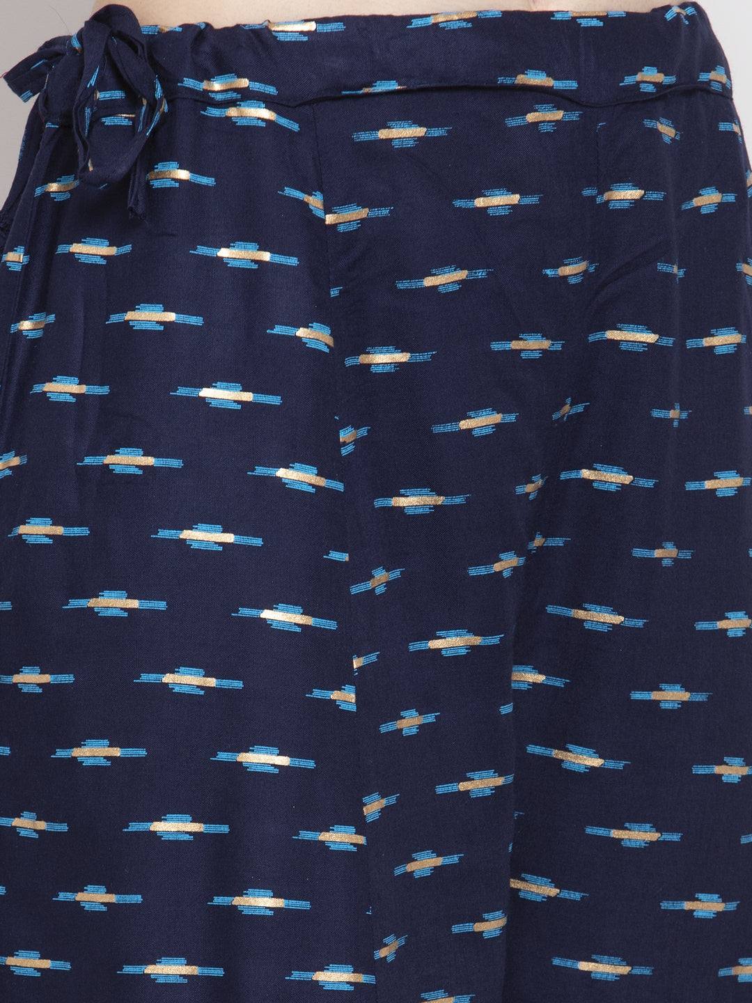 Navy blue flared rayon sharara with printed design and elasticated waistband.