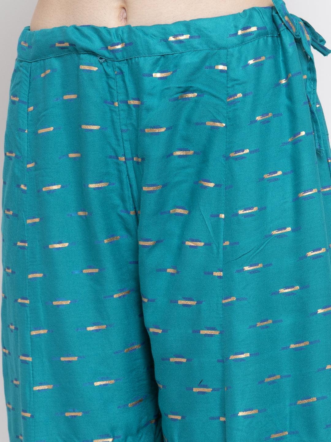 Turquoise flared printed rayon sharara with elastic waistband.