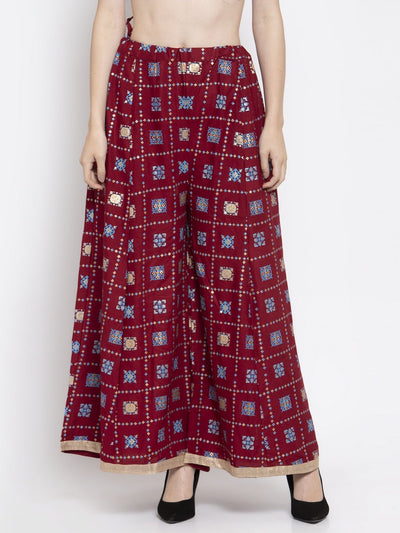 Maroon printed rayon sharara with elasticated waistband for a comfortable fit.