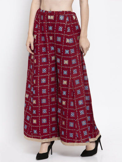 Maroon printed rayon sharara with elastic waistband.
