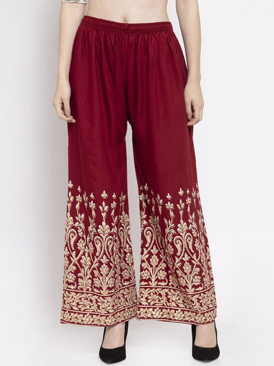 Maroon rayon printed palazzo with elastic waistband and intricate design.