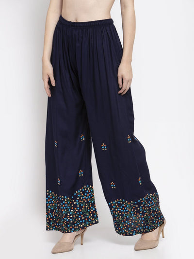 Navy blue rayon printed palazzo with elasticated waistband and colorful designs at the hem.