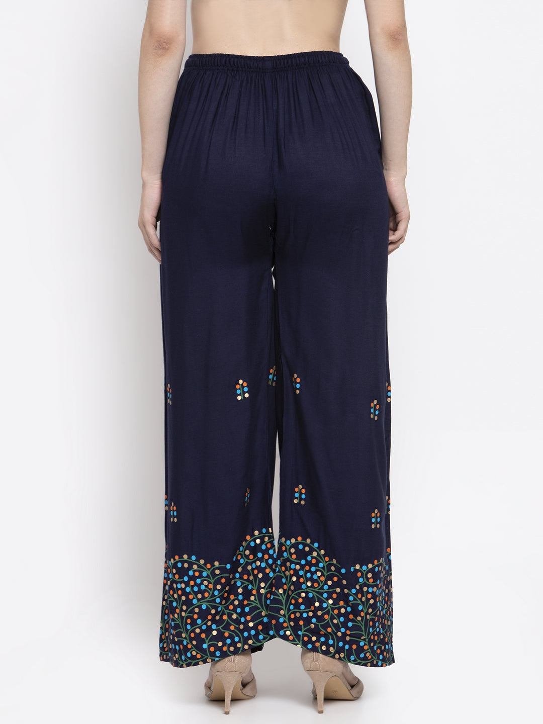 Navy blue rayon printed palazzo with elastic waistband and colorful patterns.