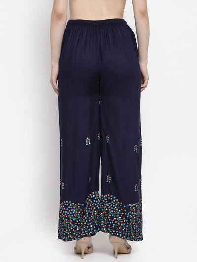 Navy blue rayon printed palazzo with elastic waistband and colorful patterns.