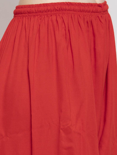 Red rayon printed palazzo with elasticated waistband.