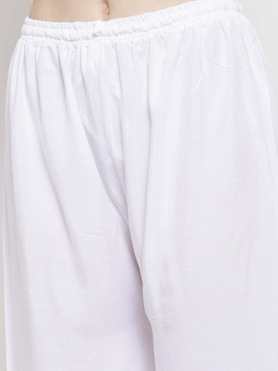 White solid rayon palazzo with elasticated waistband for a comfortable fit.
