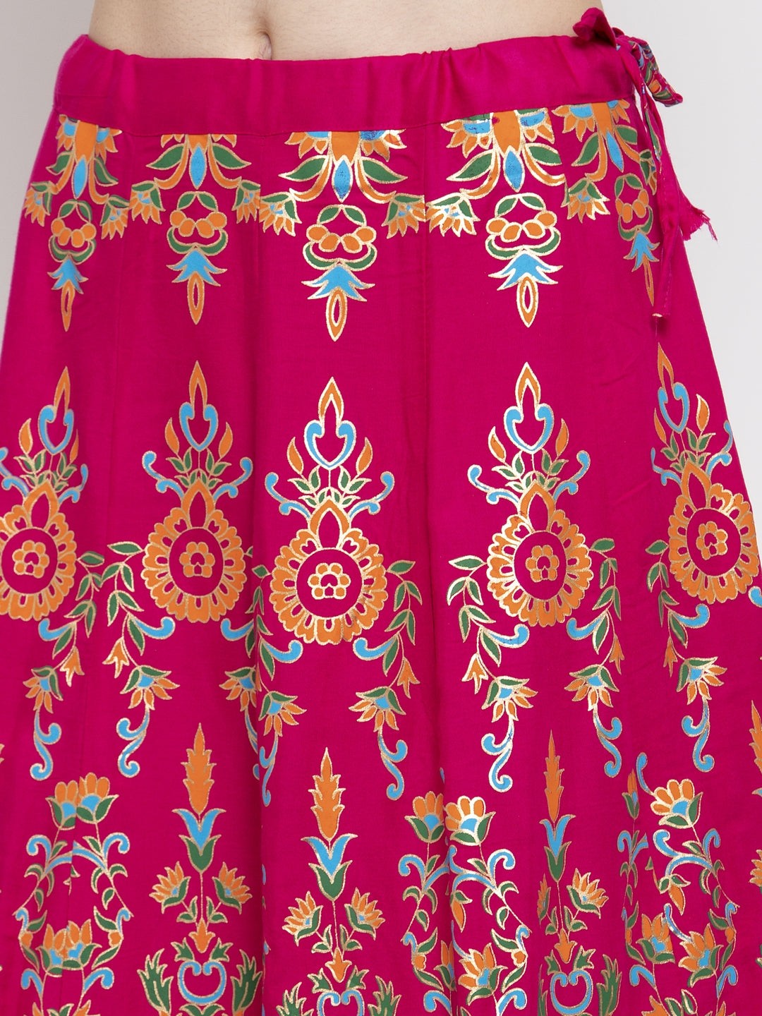 Magenta printed flared rayon maxi skirt with vibrant floral patterns.