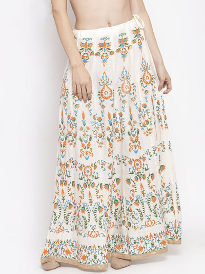 Cream printed flared rayon maxi skirt with floral design.