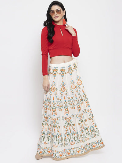 Cream printed flared rayon maxi skirt for women, styled with a red top.
