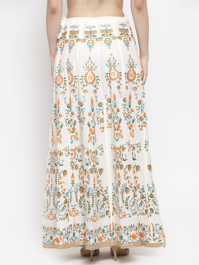 Cream printed flared rayon maxi skirt with floral design.