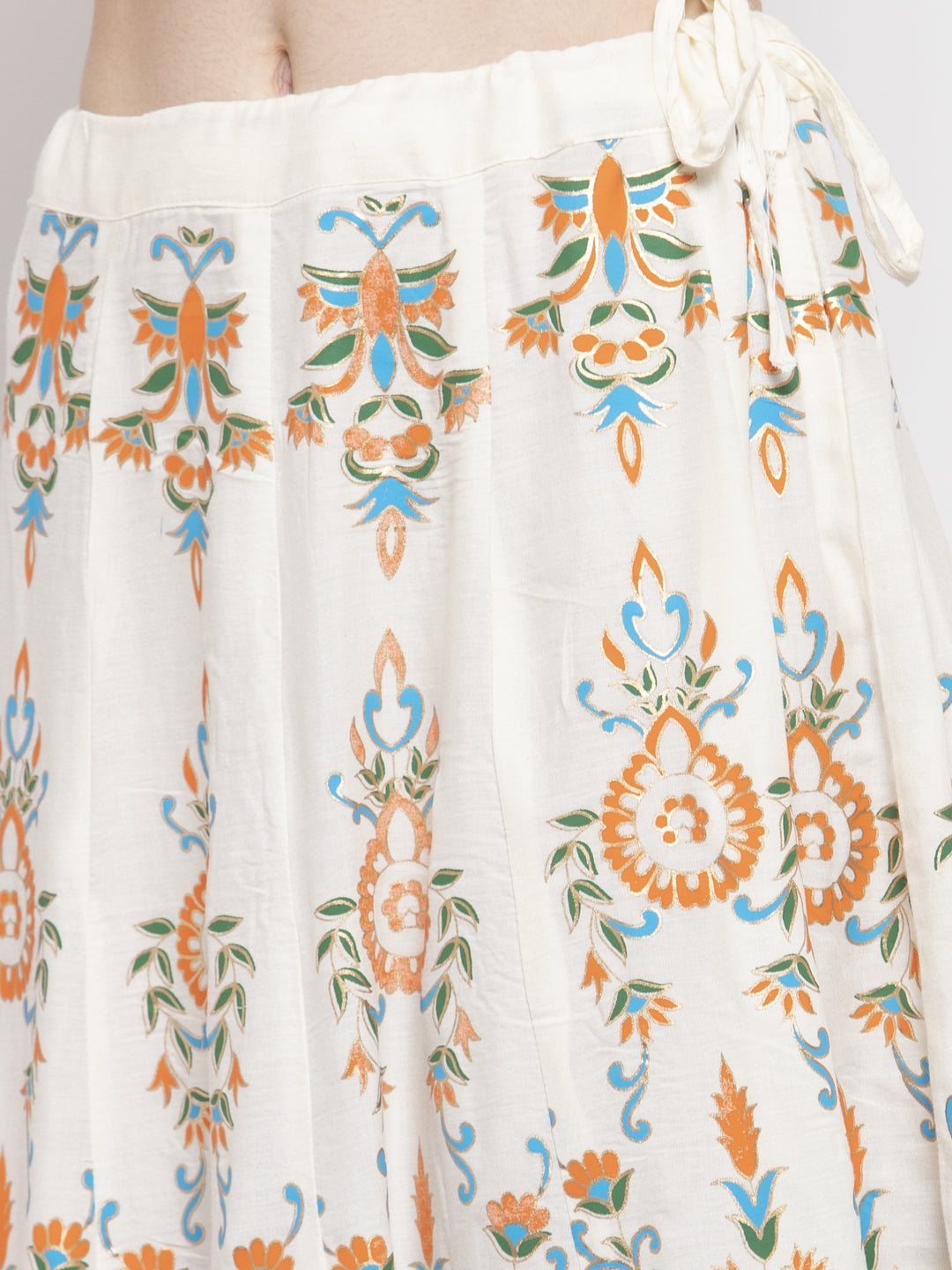 Cream printed flared rayon maxi skirt with vibrant floral patterns.