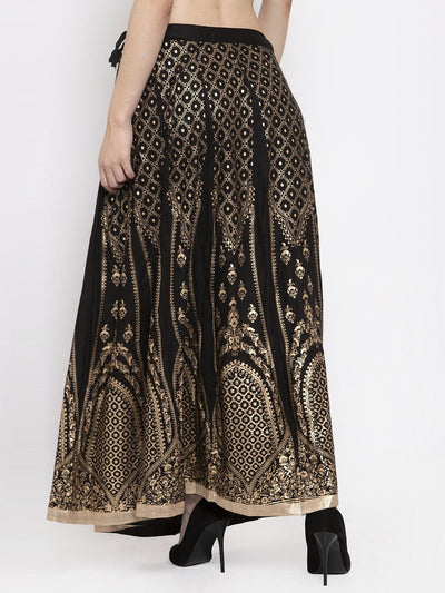 Black printed flared rayon skirt with intricate designs, ideal for stylish comfort.