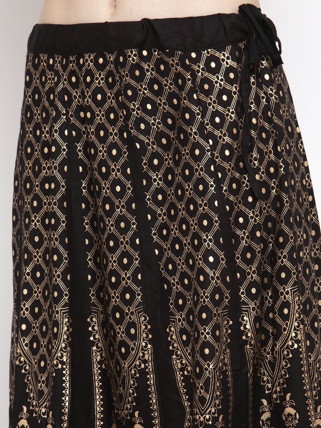 Black printed flared rayon skirt with intricate geometric patterns.