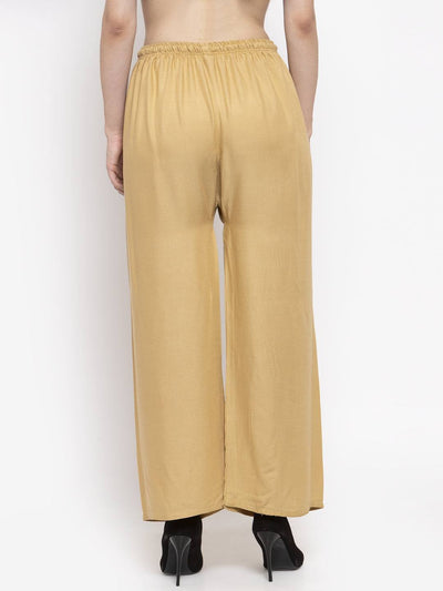 Solid fawn rayon palazzo pants with elastic waistband, perfect for fashion-forward women.