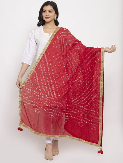 Red Bandhani Gotta Patti Silk Dupatta styled on model with white kurta.