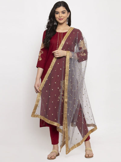 Grey heavy gotta patti net dupatta with ethnic design styled with red kurta palazzo set.