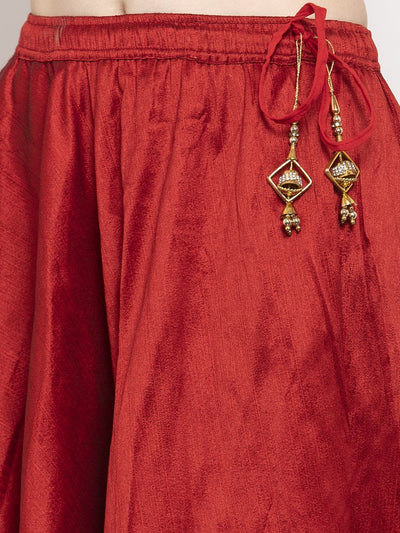 Maroon flared embellished skirt made from raw silk fabric.