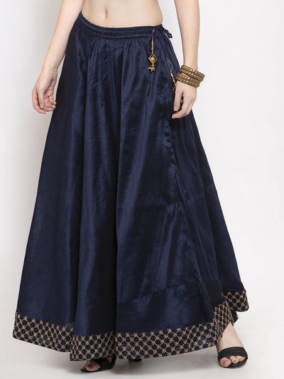 Navy blue flared embellished skirt made from raw silk fabric.