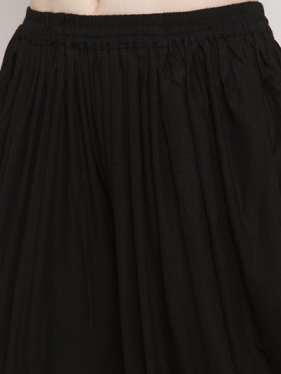Black solid rayon dhoti salwar with elasticated waistband and drawstring.