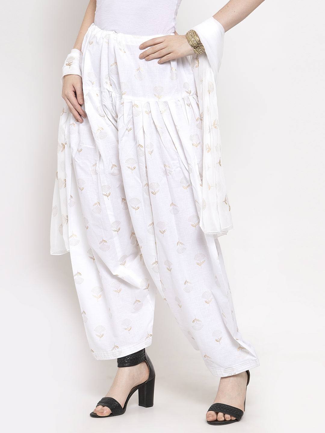 White printed salwar dupatta set made from cotton, paired with solid colored kurta.