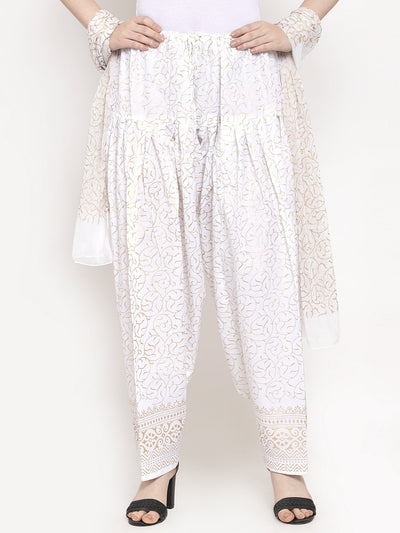 White printed salwar dupatta set made of cotton fabric, featuring intricate designs for a fashionable look.