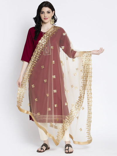 Fawn embellished net dupatta with gold detailing, styled with maroon kurta.