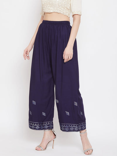 Navy Blue Embellished Rayon Palazzo with mirror work hem and elasticated waistband.