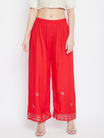 Red Embellished Rayon Palazzo with mirror work and elastic waistband.