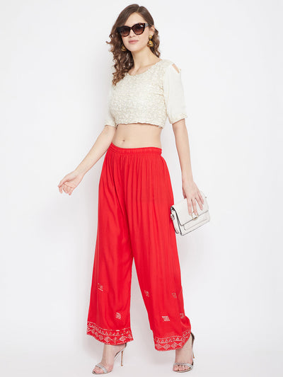 Red Embellished Rayon Palazzo with mirror work and elasticated waistband.