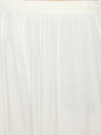 Cream embellished rayon palazzo with elasticated waistband and mirror work hem.