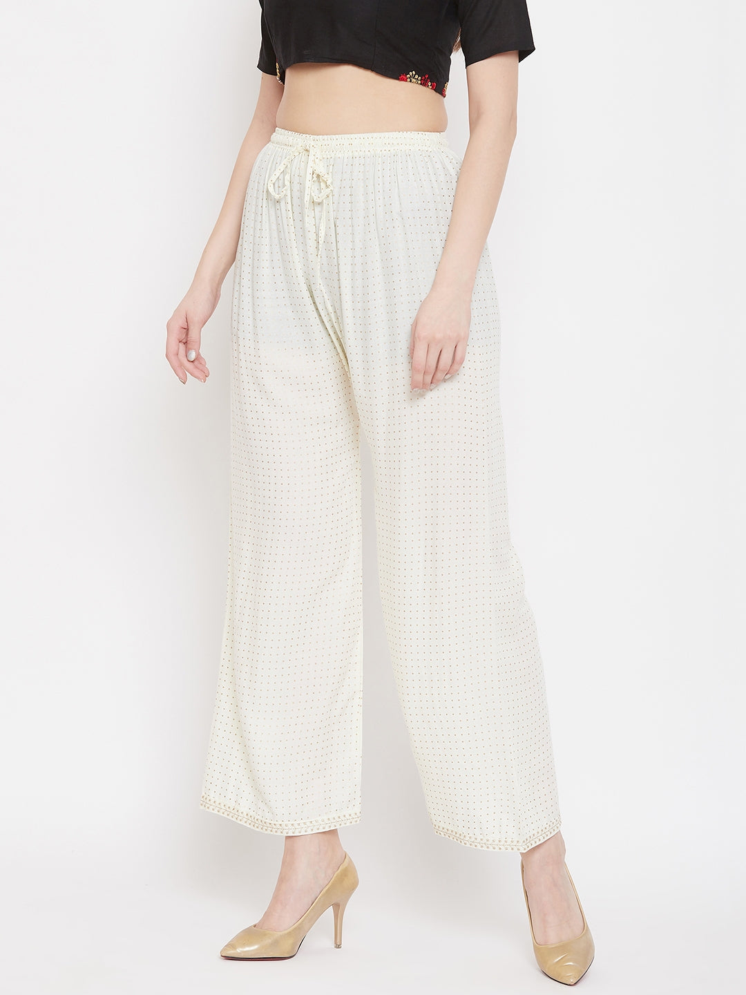 Cream straight printed palazzo in rayon with a stylish design.