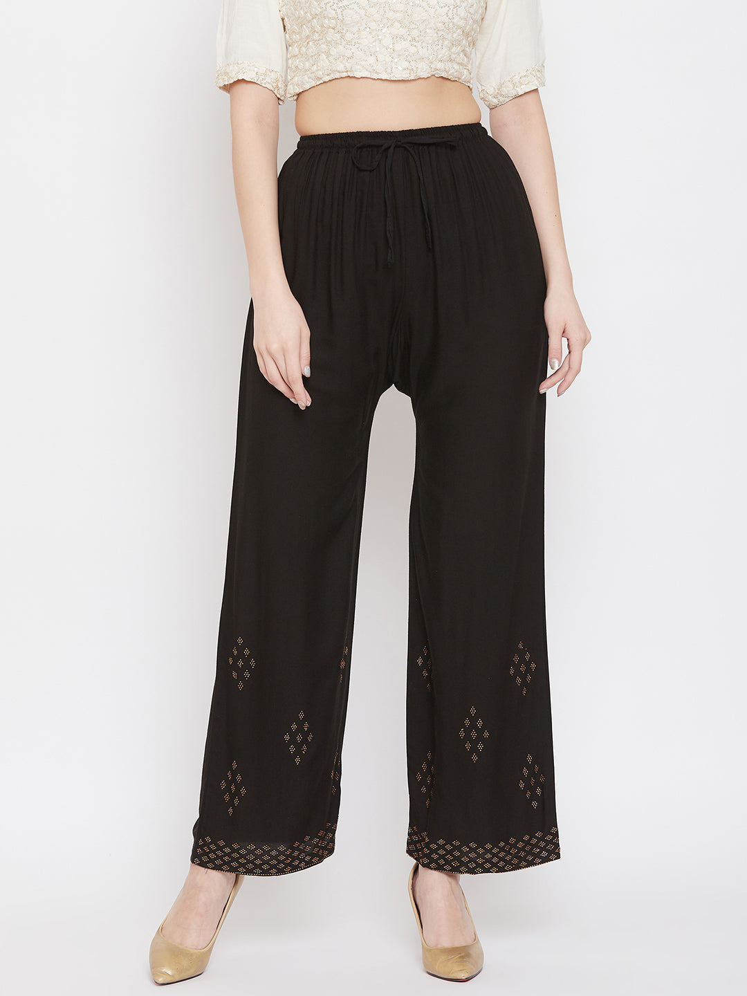 Black straight embellished palazzo with stone work and elastic waistband.