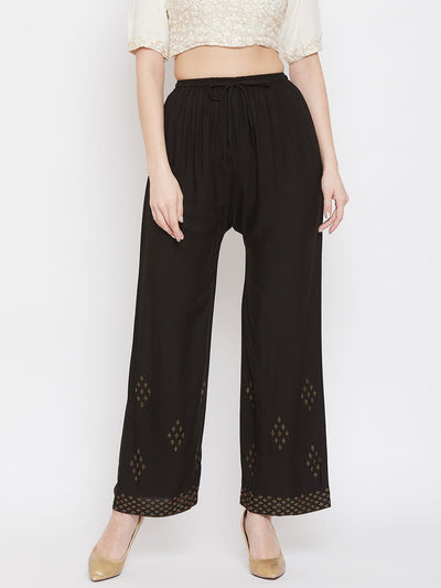 Black straight embellished palazzo with stone work and elastic waistband.