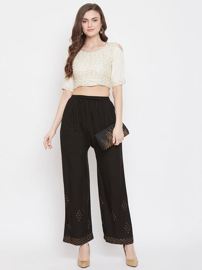 Black straight embellished palazzo with stone work and elasticated waistband by Clora.
