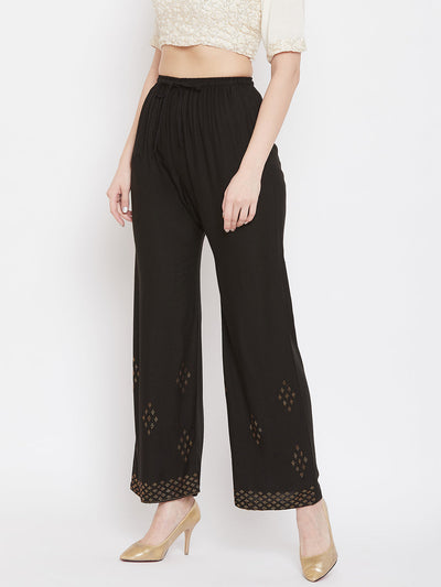 Black straight embellished palazzo with stone work and elastic waistband.