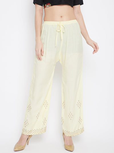 Cream straight embellished palazzo with elasticated waistband and stone work hem.