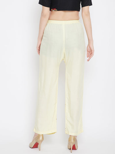 Cream straight embellished palazzo with elasticated waistband and hem stone work.