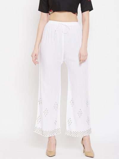 White straight embellished palazzo with stone work and elasticated waistband.