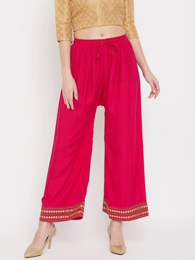 Magenta embroidered straight palazzo with hem design.