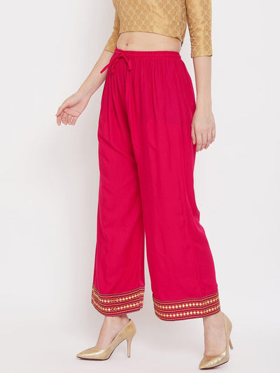 Magenta hem design embroidered straight palazzo with comfortable rayon fabric.