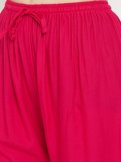 Magenta hem design embroidered straight palazzo in rayon fabric.