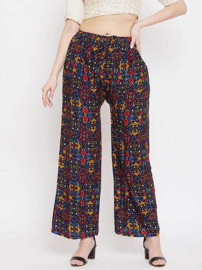 Navy blue printed rayon palazzo with vibrant pattern.
