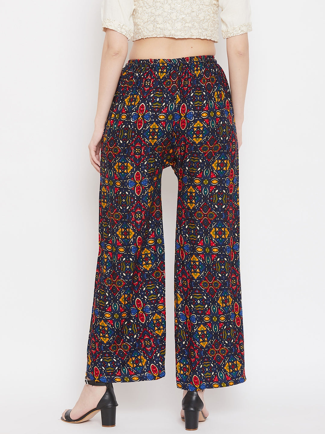 Navy blue printed rayon palazzo with colorful patterns, perfect for social functions.