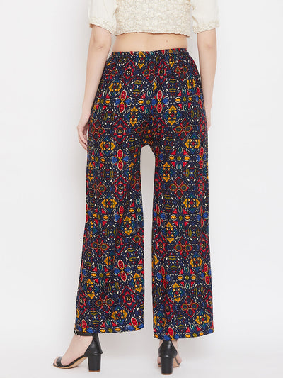 Navy blue printed rayon palazzo with colorful patterns, perfect for social functions.