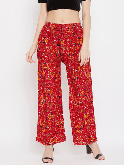 Red printed rayon palazzo with vibrant design for a stylish look.