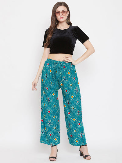 Turquoise printed rayon palazzo with vibrant pattern, perfect for a trendy look.