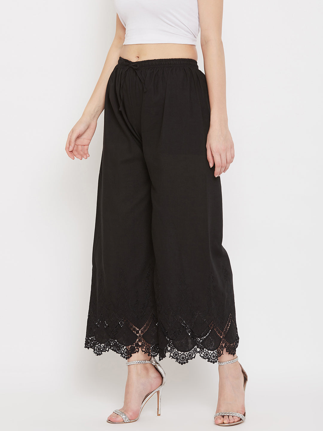 Black straight embroidered palazzo with elasticated waistband.